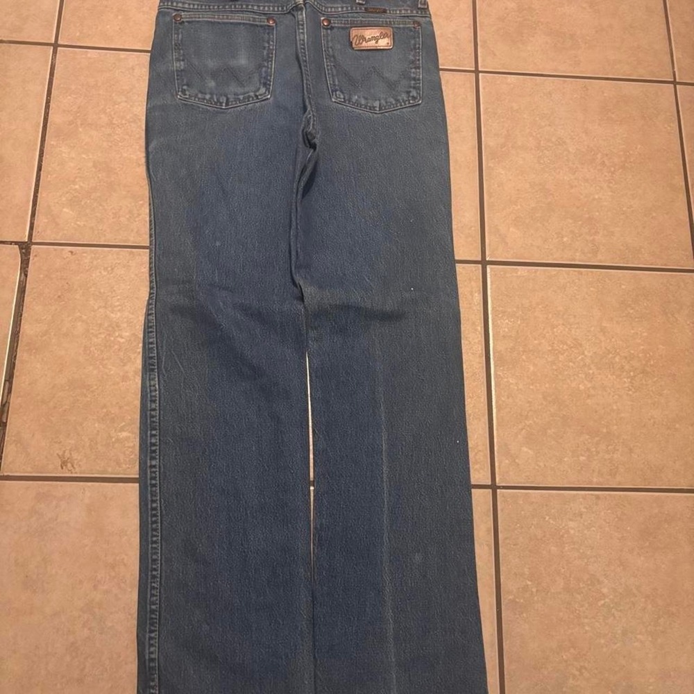 Wrangler blue jeans with a distressed look Size 32x32